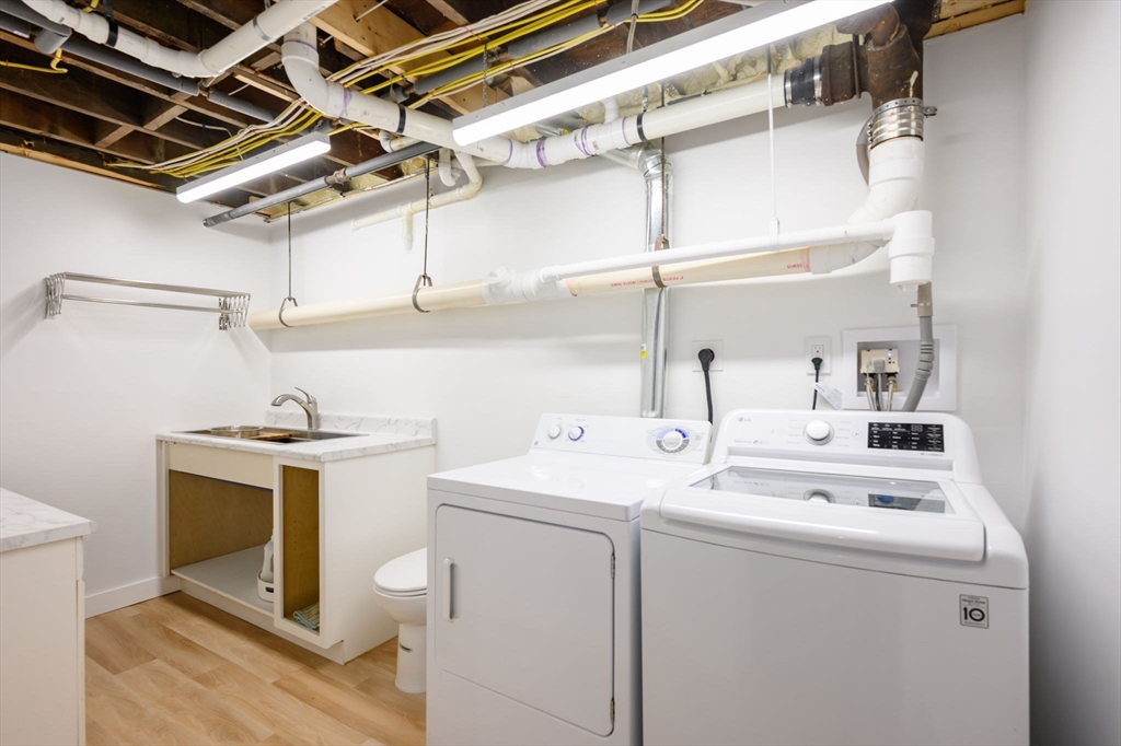 13 Smith Road Hingham, MA 02043 - Photo 22 of 32 a utility room with dryer and washer