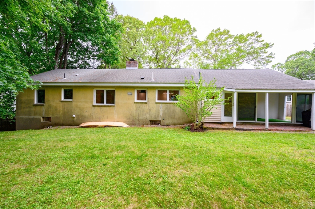 13 Smith Road Hingham, MA 02043 - Photo 27 of 32 a view of a house with a yard and sitting area