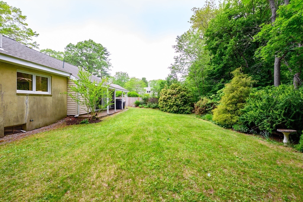 13 Smith Road Hingham, MA 02043 - Photo 28 of 32 a house view with a garden space