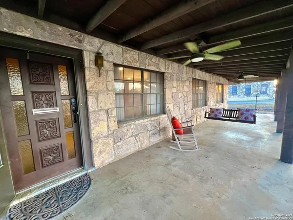a front view of a building with a glass door
