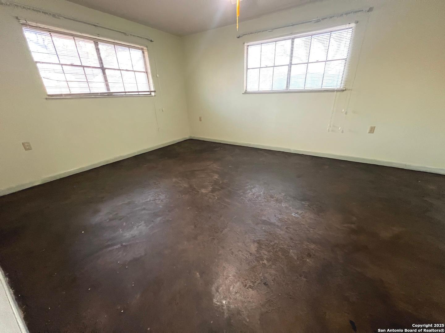 433 Fort Clark Road Brackettville, TX 78832 - Photo 22 of 46 an empty room with a window