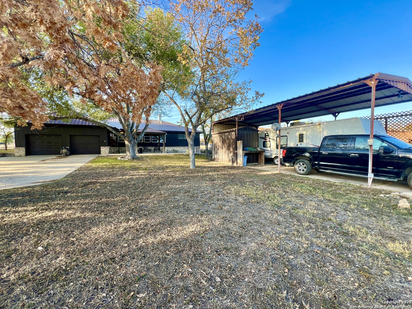 433 Fort Clark Road Brackettville, TX 78832 - Photo 27 of 46 a view of a house with a yard
