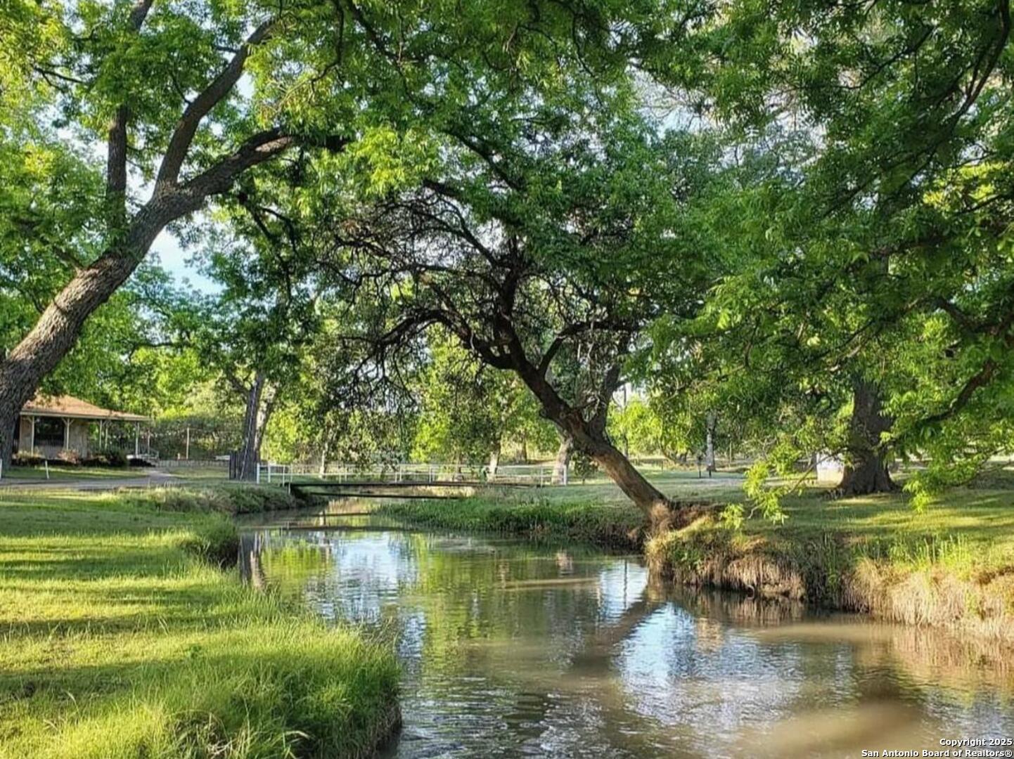 433 Fort Clark Road Brackettville, TX 78832 - Photo 39 of 46 a view of lake with green space