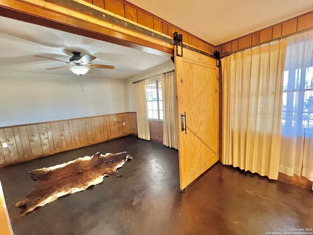 a living room with couch and a table