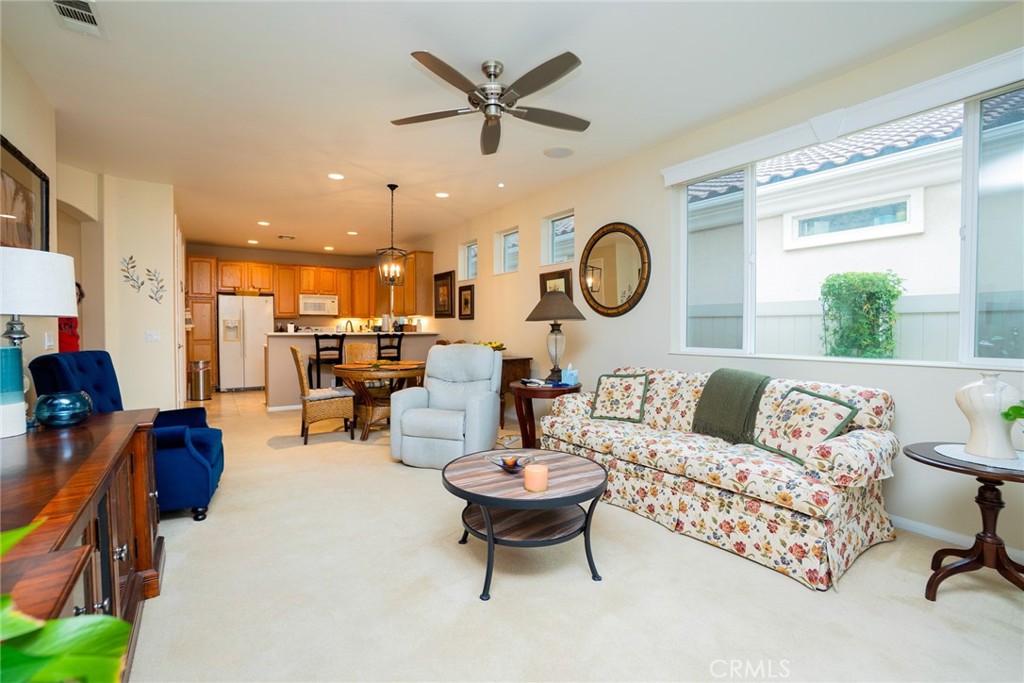 1165 Wisteria Way Beaumont, CA 92223 - Photo 14 of 49 a living room with furniture and a large window
