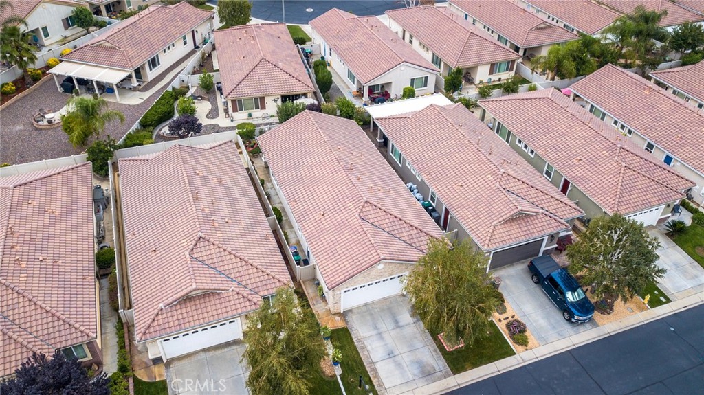 1165 Wisteria Way Beaumont, CA 92223 - Photo 40 of 49 an aerial view of residential houses with outdoor space