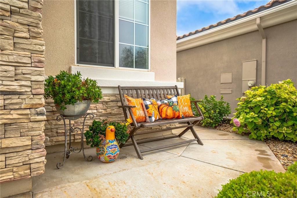1165 Wisteria Way Beaumont, CA 92223 - Photo 4 of 49 a view of a bench in the patio