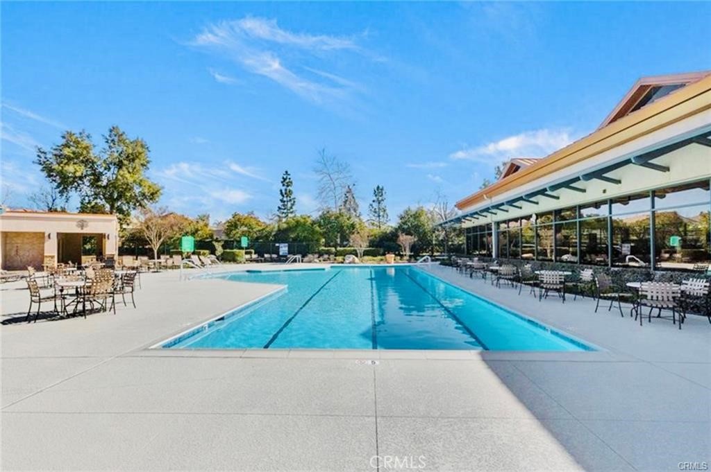 1165 Wisteria Way Beaumont, CA 92223 - Photo 49 of 49 a view of swimming pool with outdoor seating and a patio