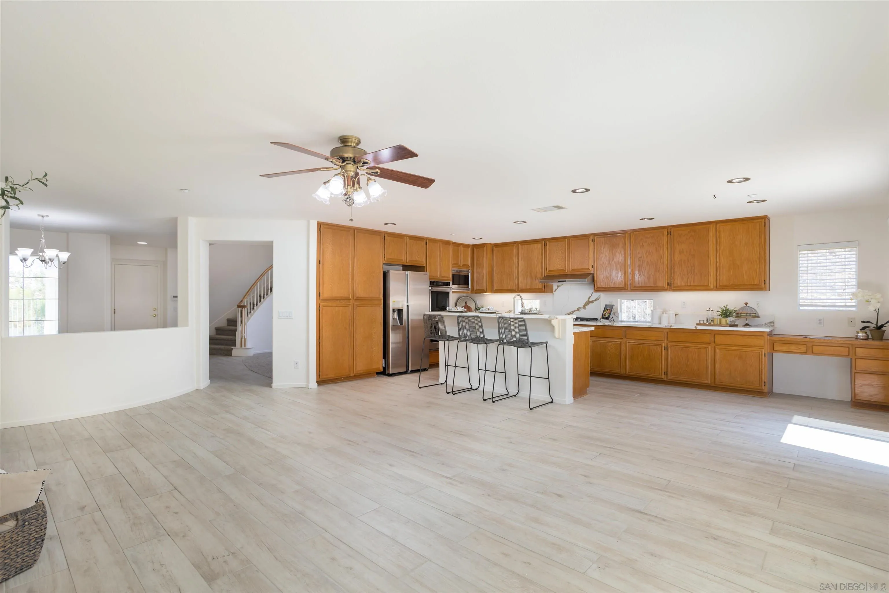 2168 Pointe Parkway Spring Valley, CA 91978 - Photo 12 of 50 a view of a kitchen with furniture and a ceiling fan