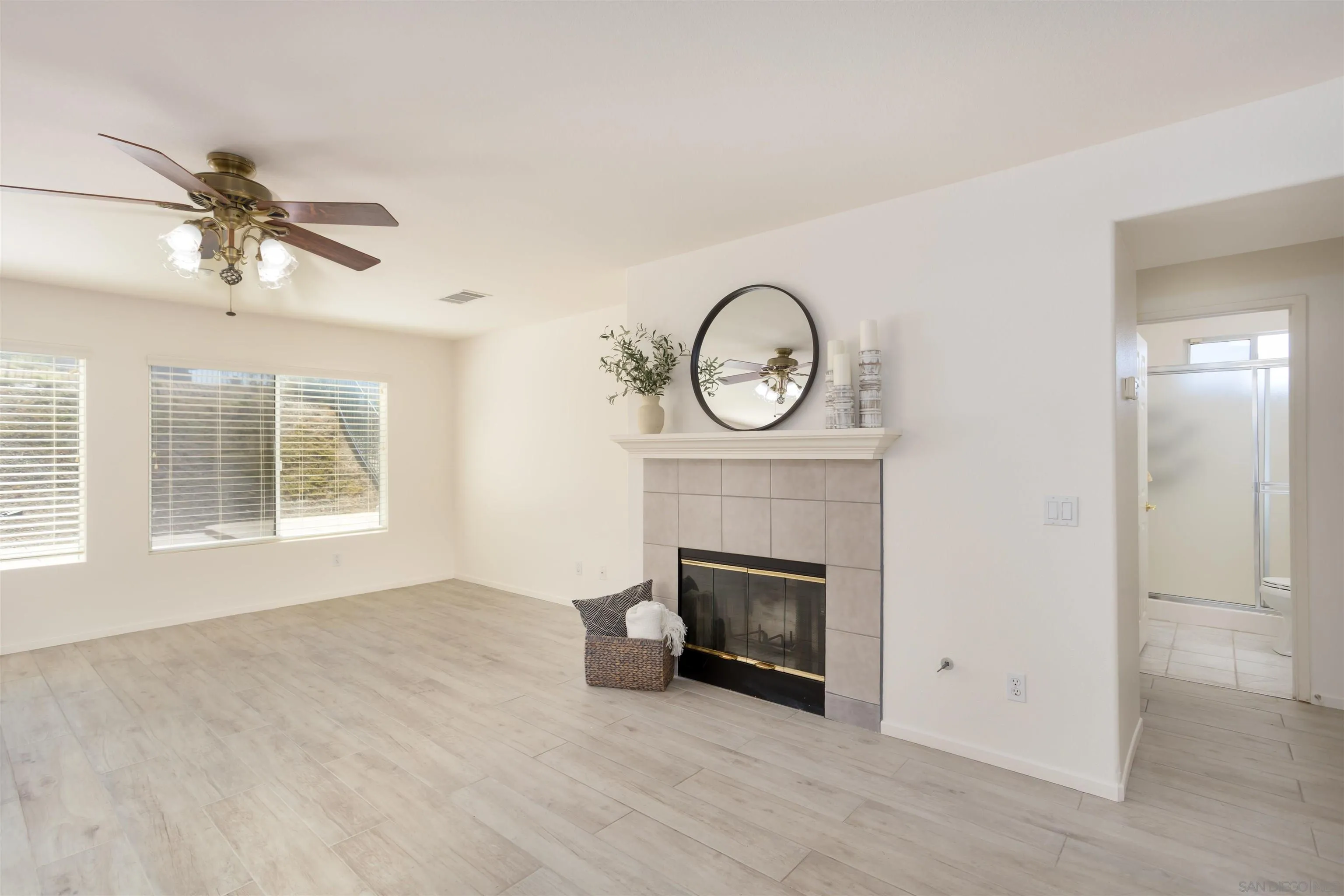 2168 Pointe Parkway Spring Valley, CA 91978 - Photo 17 of 50 a view of empty room with fireplace and fan