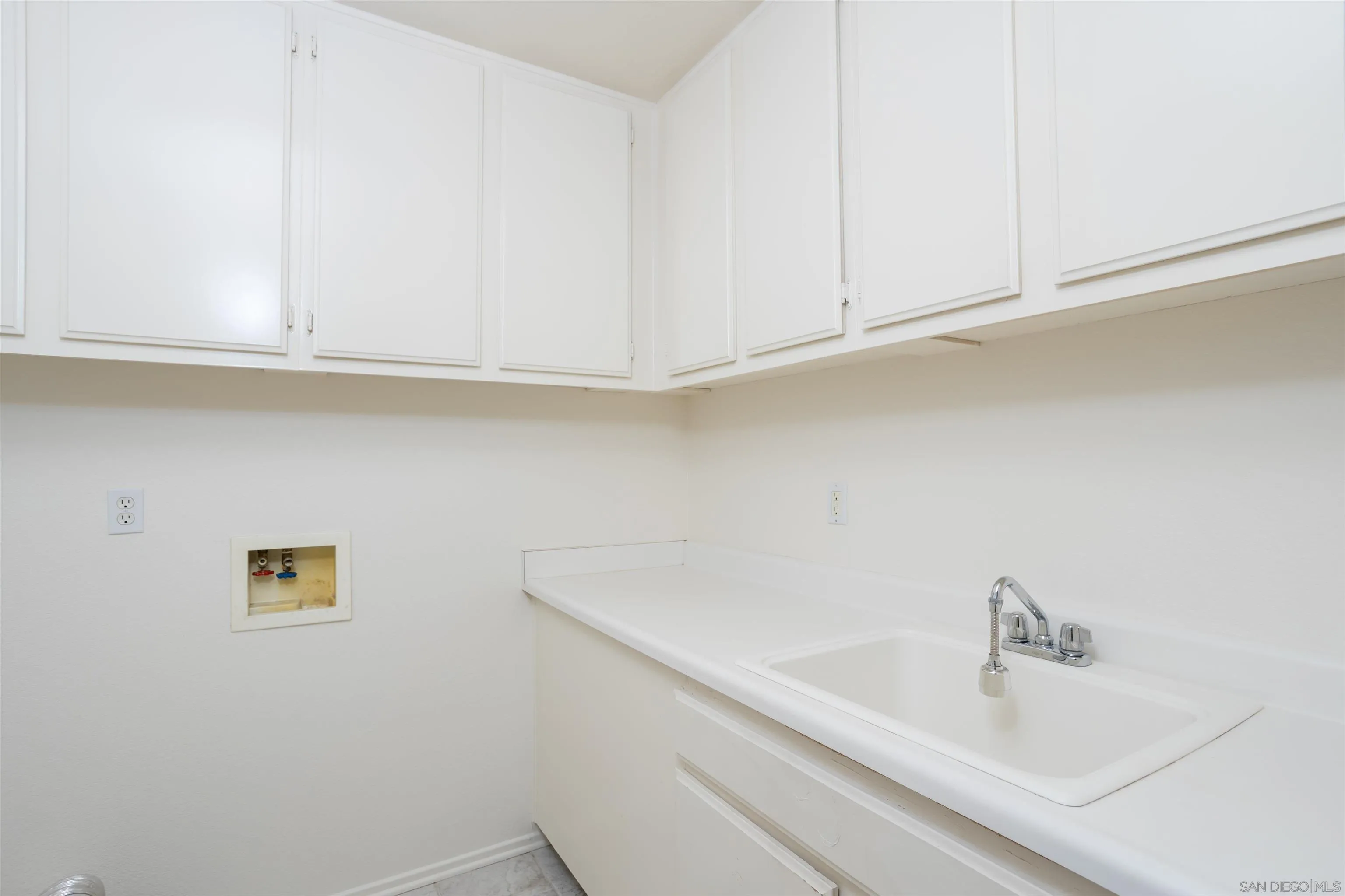 2168 Pointe Parkway Spring Valley, CA 91978 - Photo 21 of 50 a bathroom with a sink and cabinets