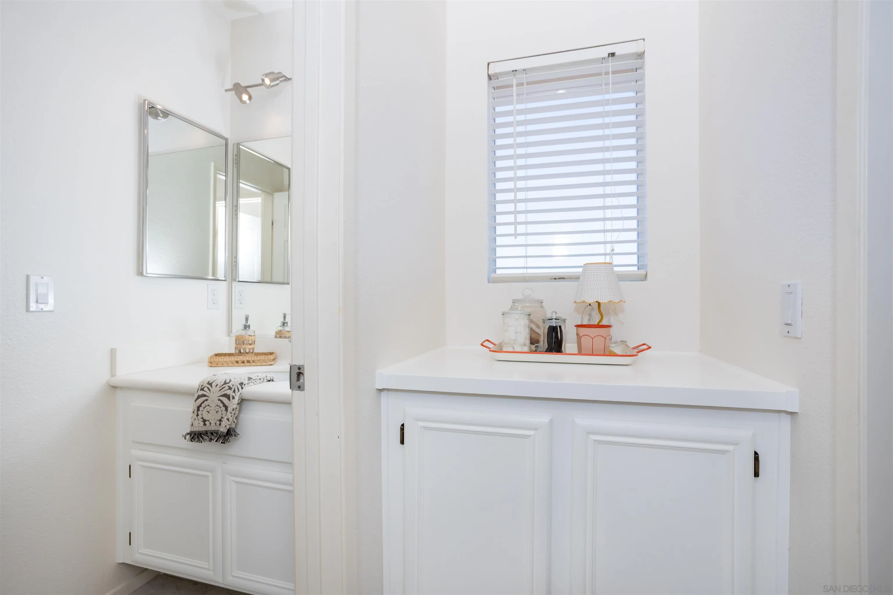 2168 Pointe Parkway Spring Valley, CA 91978 - Photo 24 of 50 a bathroom with a sink and a mirror