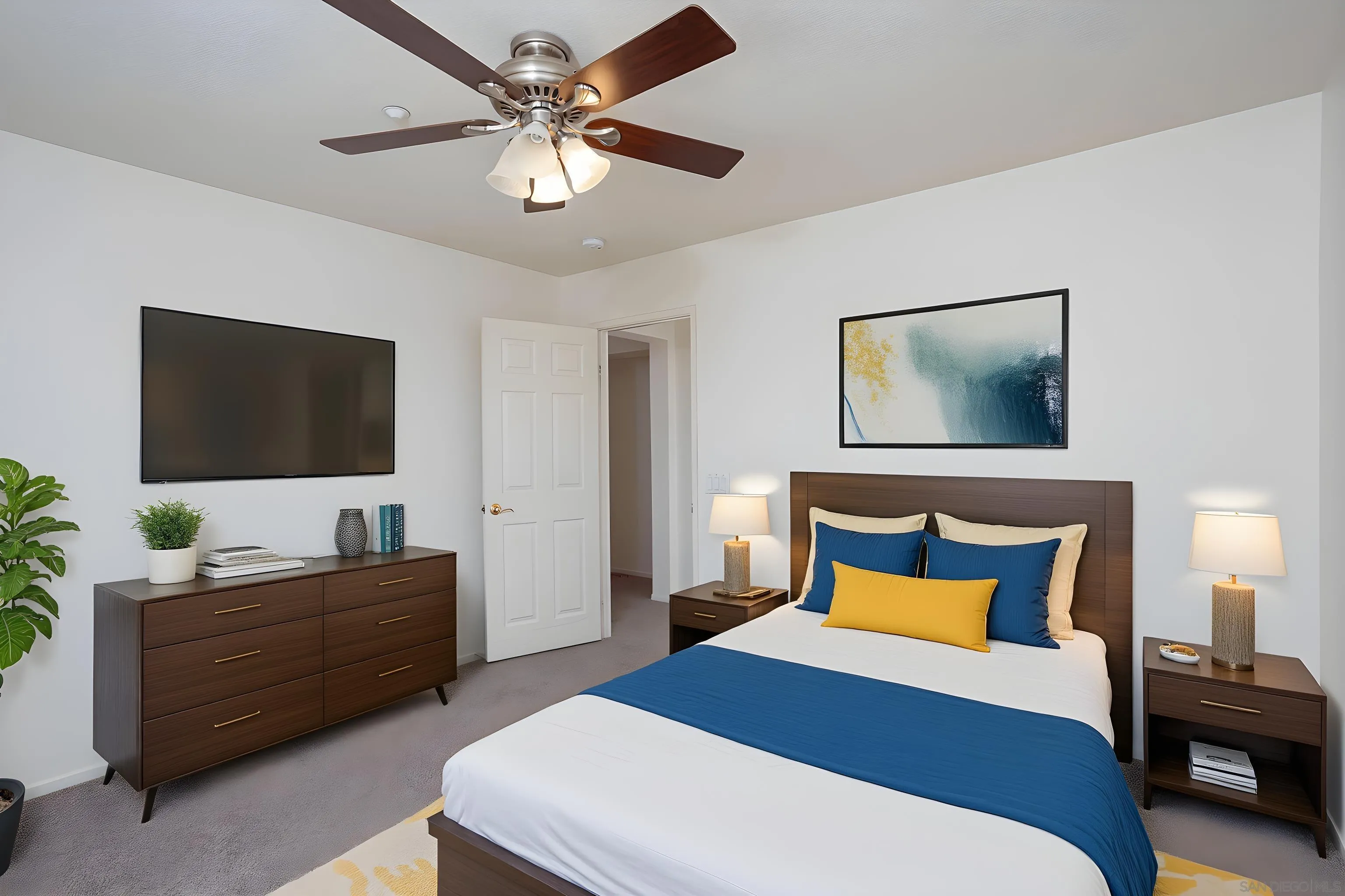 2168 Pointe Parkway Spring Valley, CA 91978 - Photo 27 of 50 a bedroom with a bed and a flat screen tv