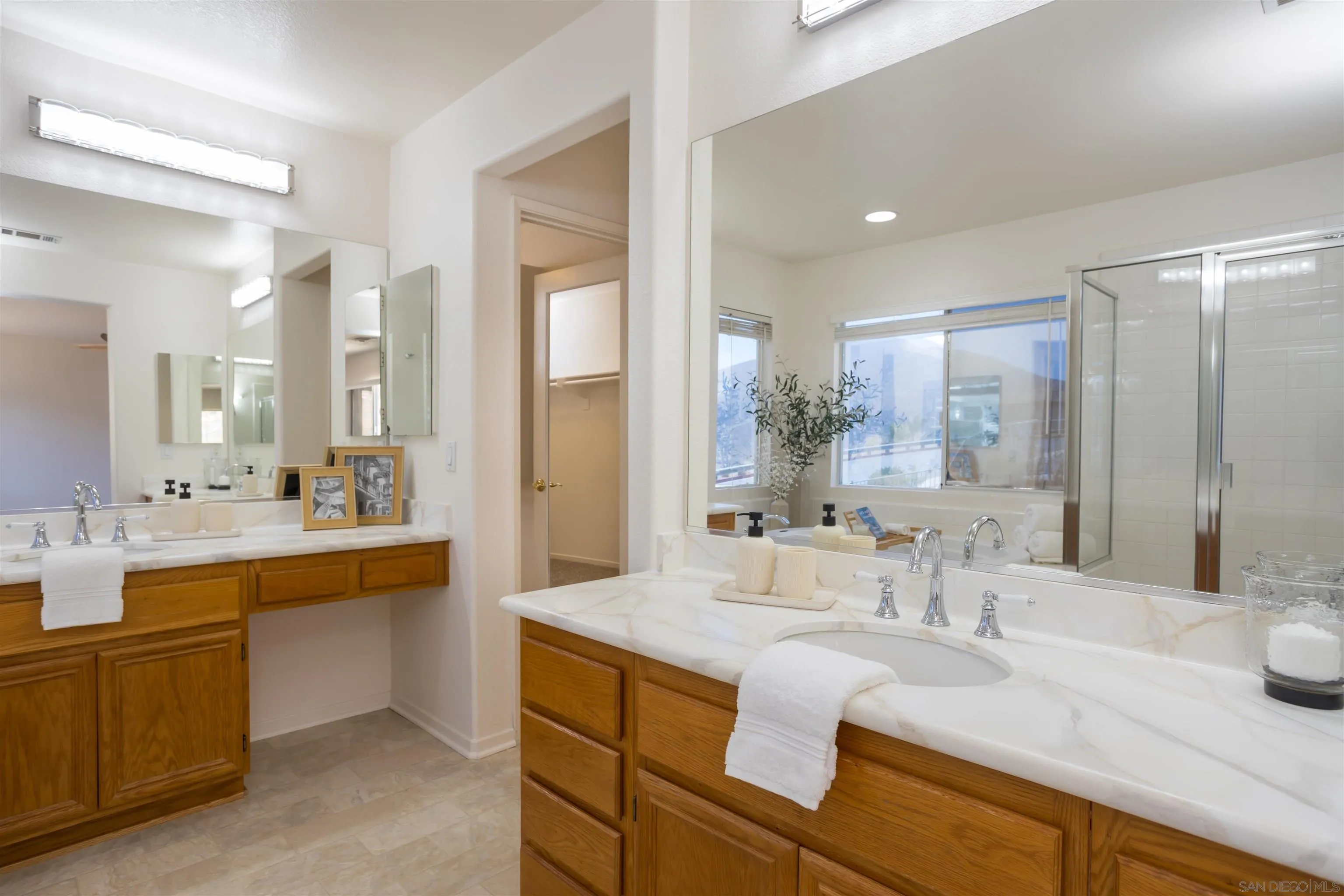 2168 Pointe Parkway Spring Valley, CA 91978 - Photo 31 of 50 a bathroom with a granite countertop sink mirror and double