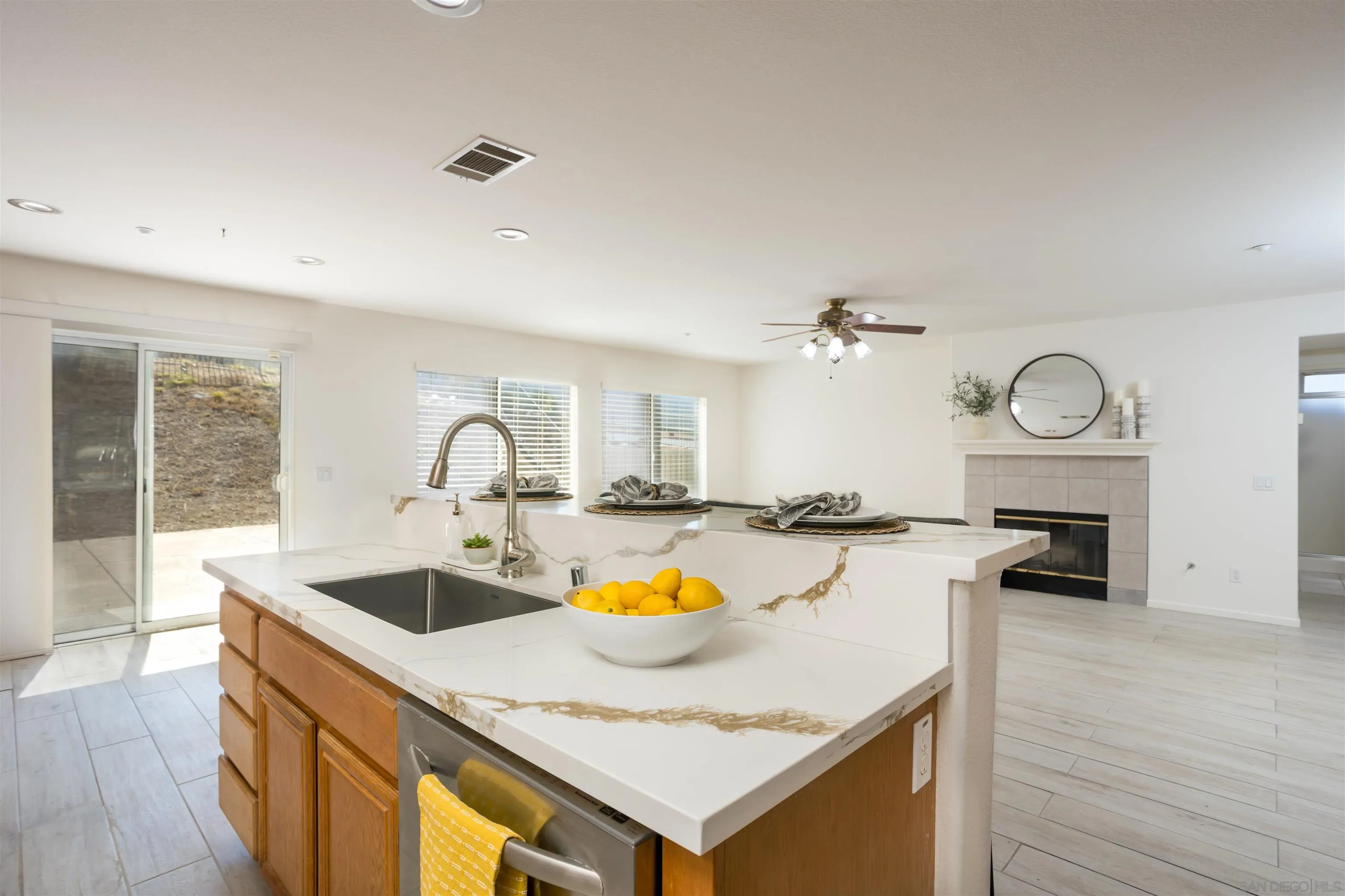2168 Pointe Parkway Spring Valley, CA 91978 - Photo 5 of 50 a kitchen with a sink a stove and cabinets