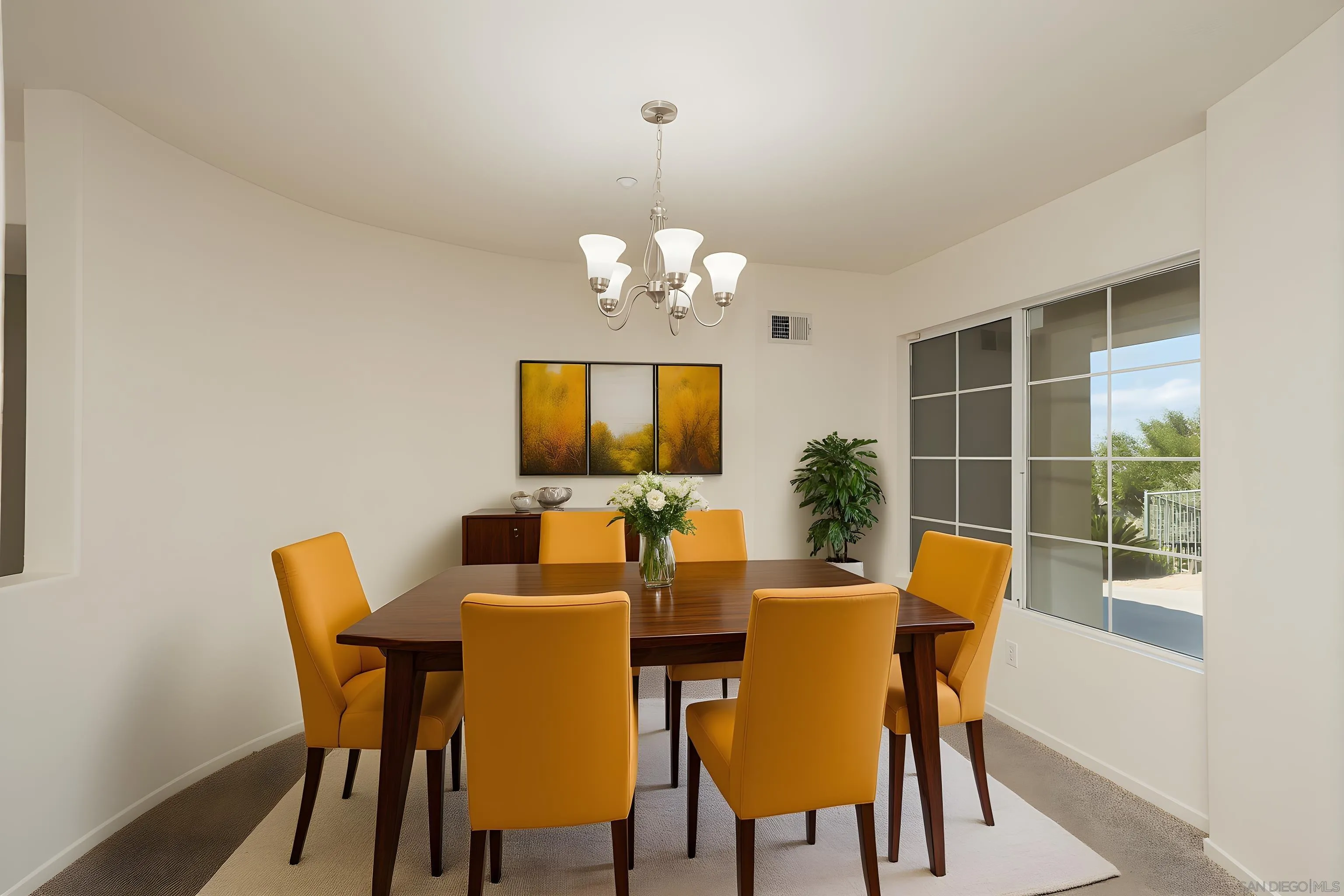 2168 Pointe Parkway Spring Valley, CA 91978 - Photo 10 of 50 a view of a dining room with furniture and a chandelier