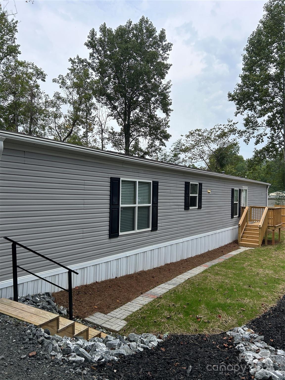 365 Rock Road Rutherfordton, NC 28139 - Photo 2 of 31 a view of a back yard of the house