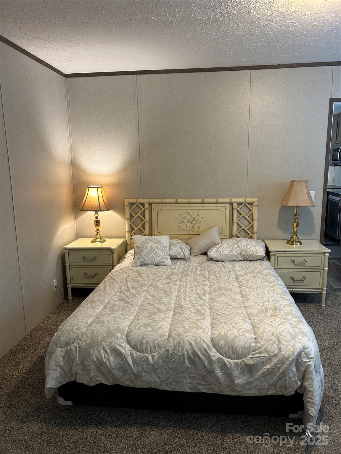 365 Rock Road Rutherfordton, NC 28139 - Photo 25 of 31 a bedroom with a bed and a night stand