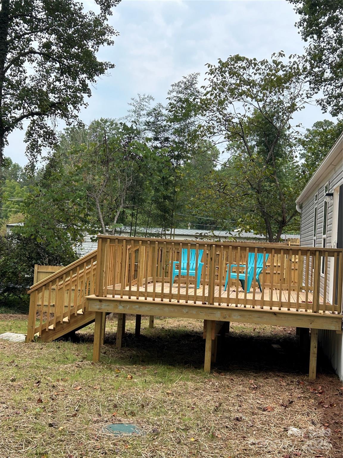 365 Rock Road Rutherfordton, NC 28139 - Photo 31 of 31 a view of a balcony with two chairs and a table