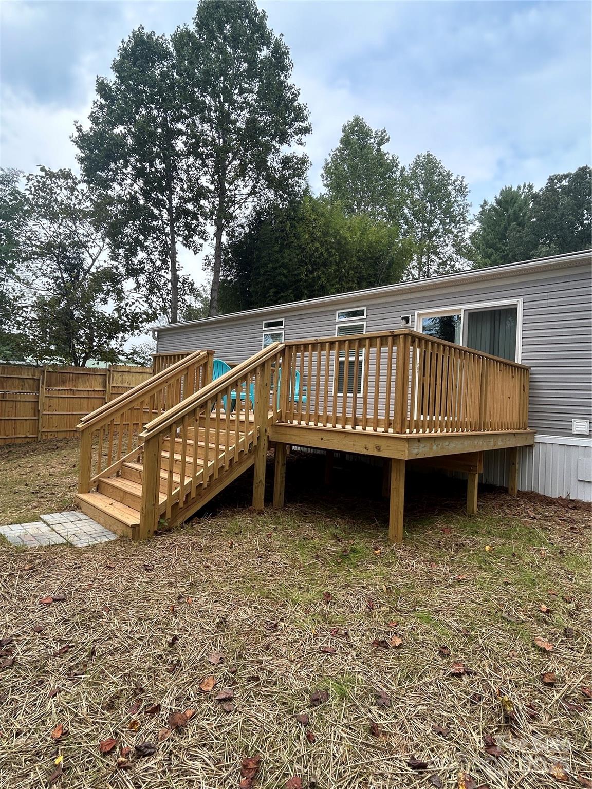 365 Rock Road Rutherfordton, NC 28139 - Photo 4 of 31 a view of a house with a wooden deck
