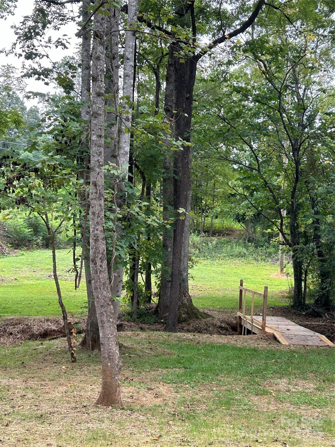 365 Rock Road Rutherfordton, NC 28139 - Photo 9 of 31 a view of a lake with a yard
