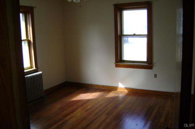 Kunkletown Road Kunkletown, PA 18058 - Photo 6 of 14 an empty room with wooden floor and windows