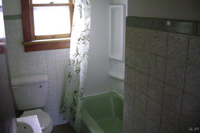 Kunkletown Road Kunkletown, PA 18058 - Photo 9 of 14 a bathroom with a toilet and a shower