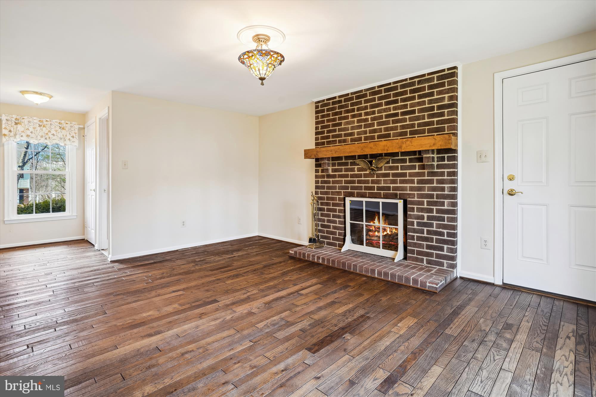 8015 Sunset Path Court Springfield, VA 22153 - Photo 11 of 40 Cozy family room with gas fireplace