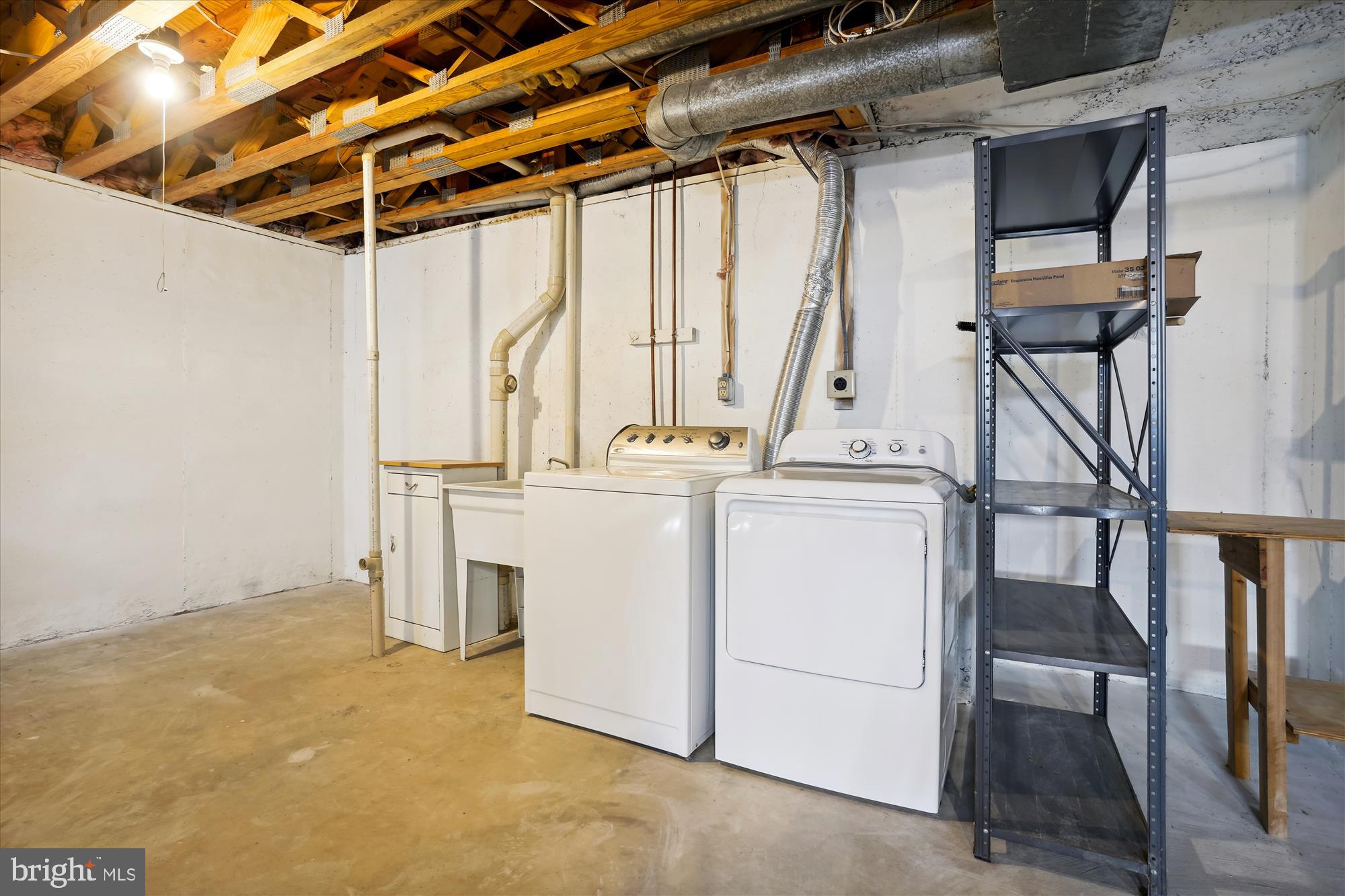 8015 Sunset Path Court Springfield, VA 22153 - Photo 34 of 40 Basement laundry room with soaking tub