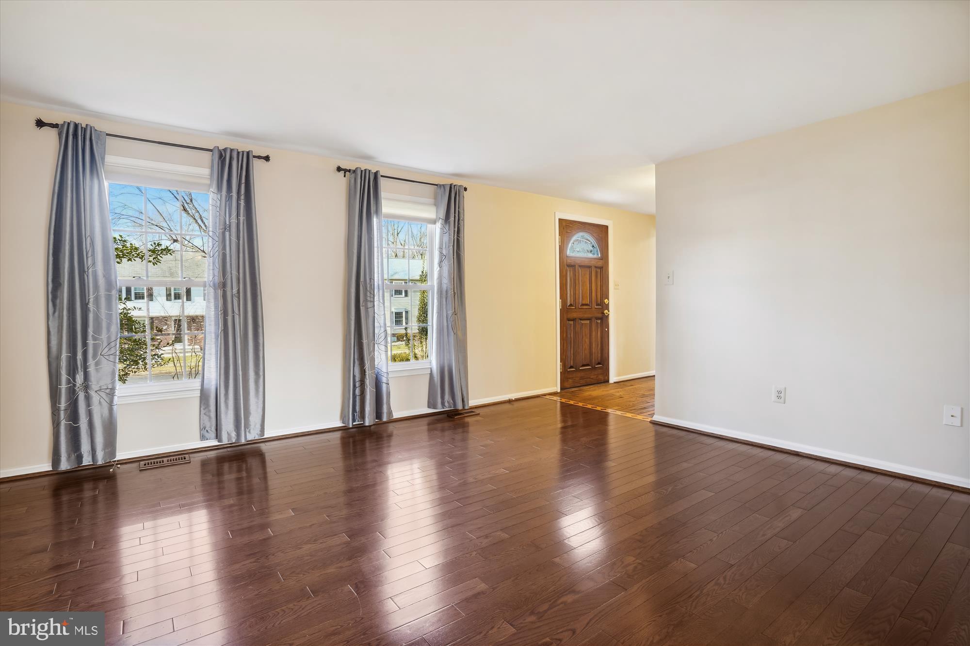 8015 Sunset Path Court Springfield, VA 22153 - Photo 4 of 40 Large formal living room with hardwood flooring