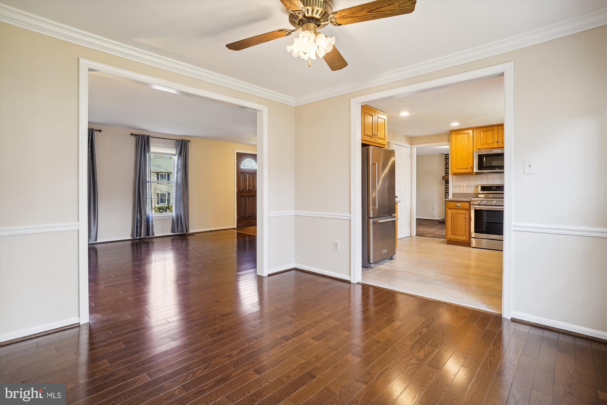 8015 Sunset Path Court Springfield, VA 22153 - Photo 6 of 40 Formal dining room with crown molding & chair rail