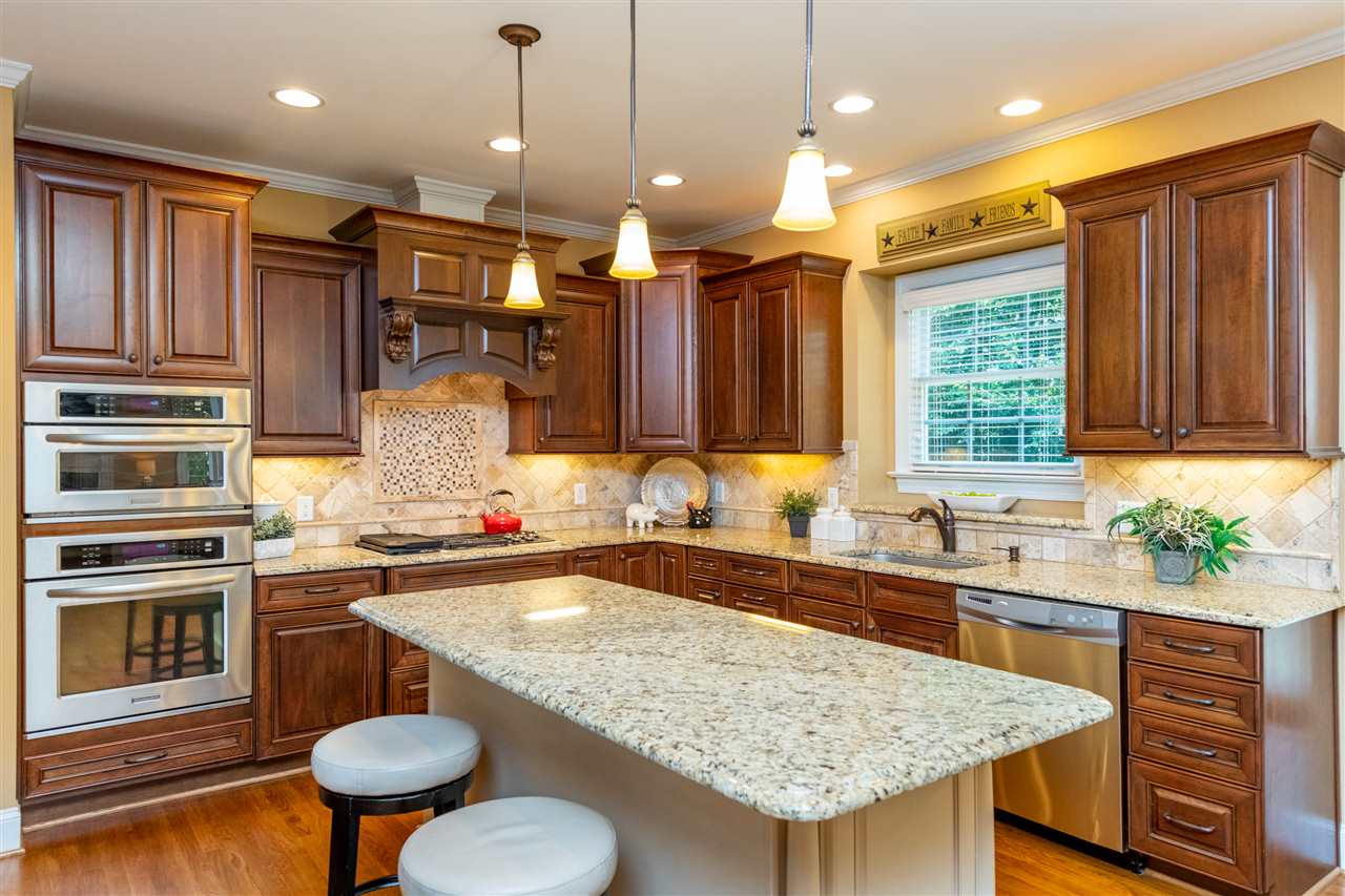 1424 Paumier Court Raleigh, NC 27615 - Photo 10 of 30 Wall Ovens and Wolf Gas Cooktop