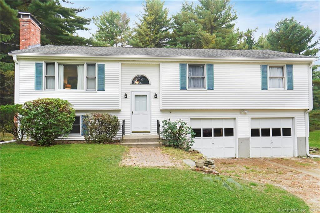 338 Leonard Bridge Road Lebanon, CT 06249 - Photo 1 of 1 a house view with a garden space