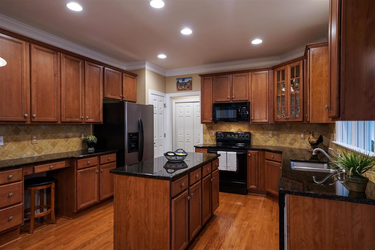 6000 Tiffield Way Wake Forest, NC 27587 - Photo 10 of 30 Large kitchen with granite, plenty of cabinets, counterspace, desk and two pantries! Kitchen