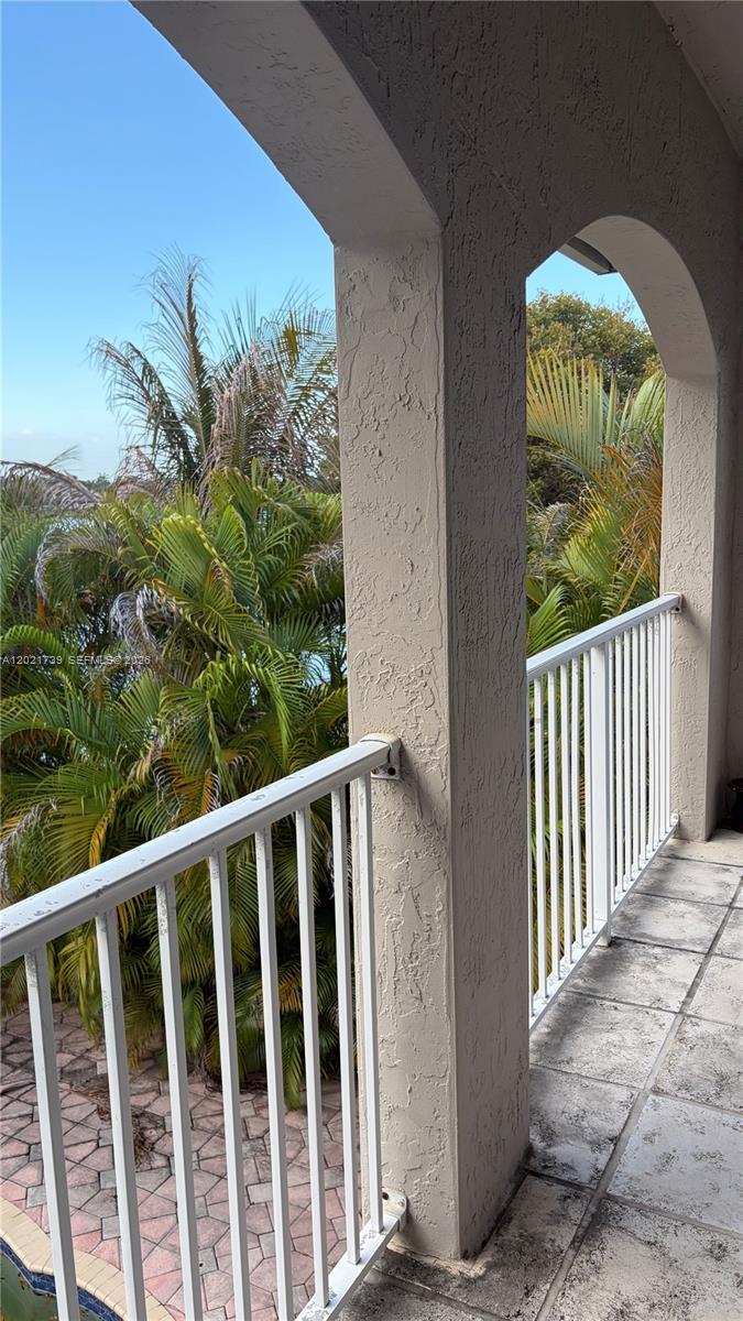 13553 Southwest 124th Avenue Road Miami, FL 33186 - Photo 19 of 31 a view of a porch
