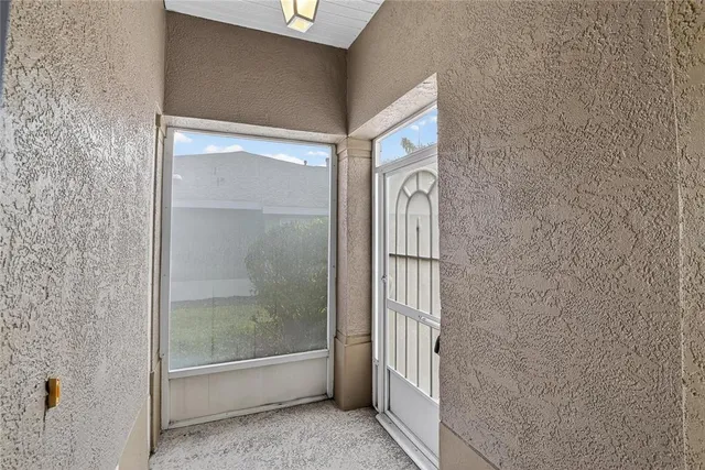 a bathroom with a shower and mirror