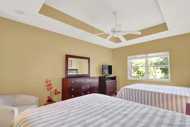 a bed room with a bed and a window