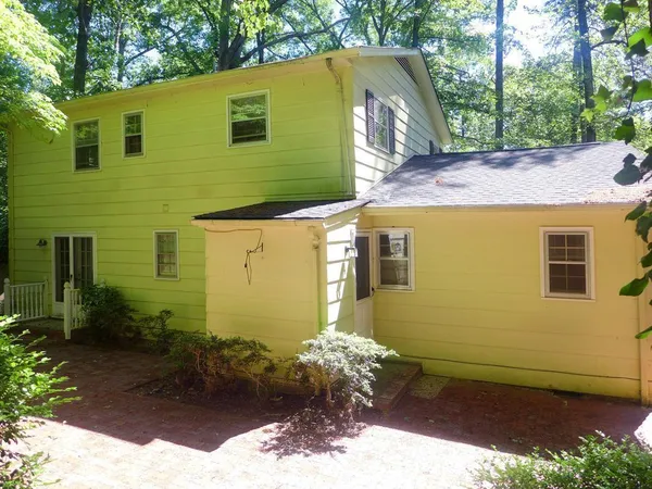 front view of a house with a yard