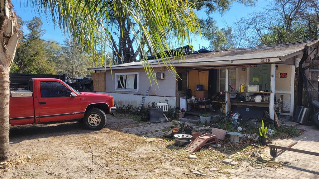 16118 Pointview Road Brooksville, FL 34601 - Photo 2 of 4 a view of a house with a patio
