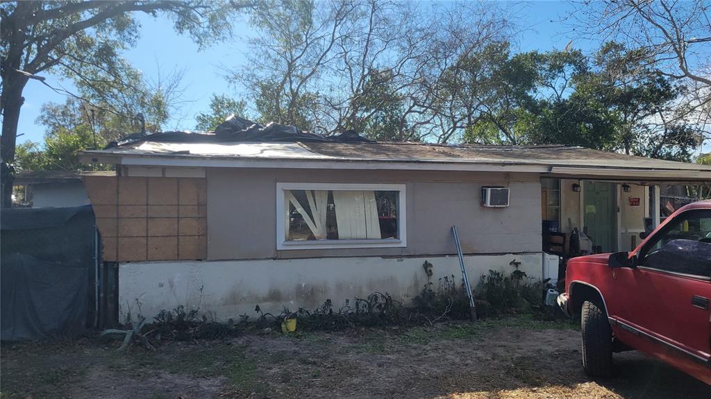 16118 Pointview Road Brooksville, FL 34601 - Photo 3 of 4 a view of a house with a backyard