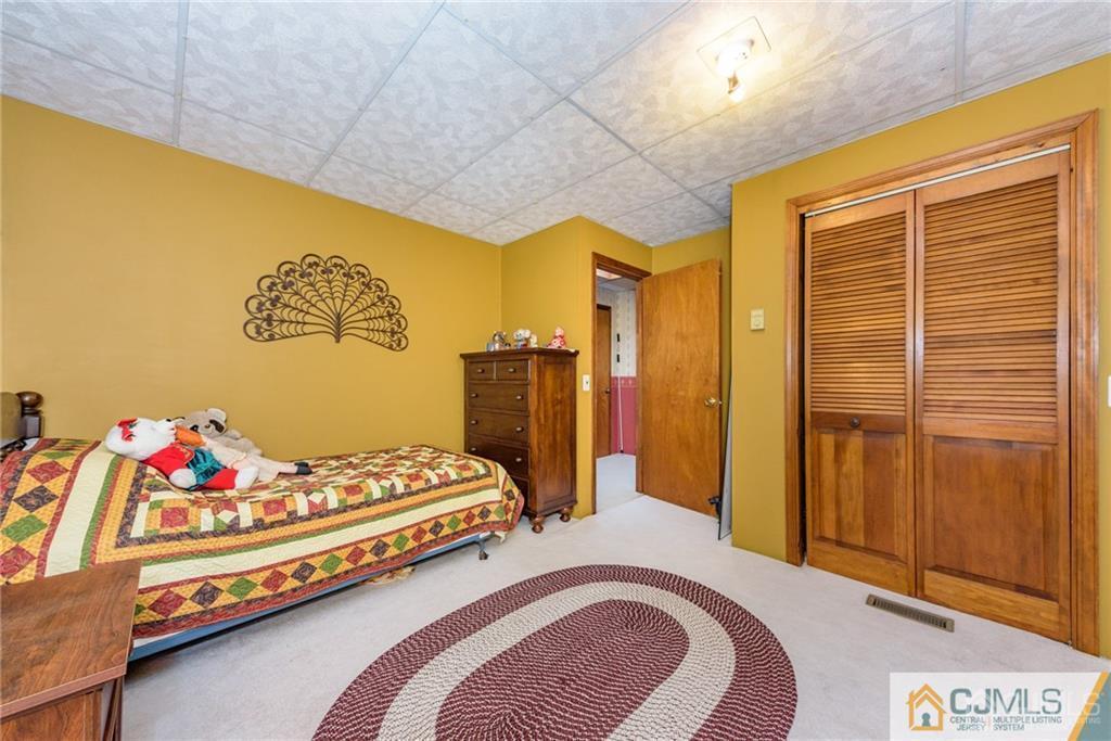 35 Warrington Road Columbia, NJ 07832 - Photo 15 of 31 a bedroom with a bed and a window