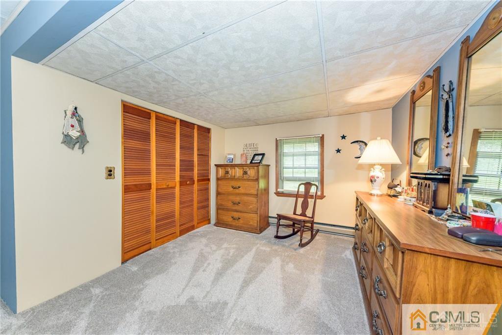 35 Warrington Road Columbia, NJ 07832 - Photo 23 of 31 a view of a bedroom with furniture and window