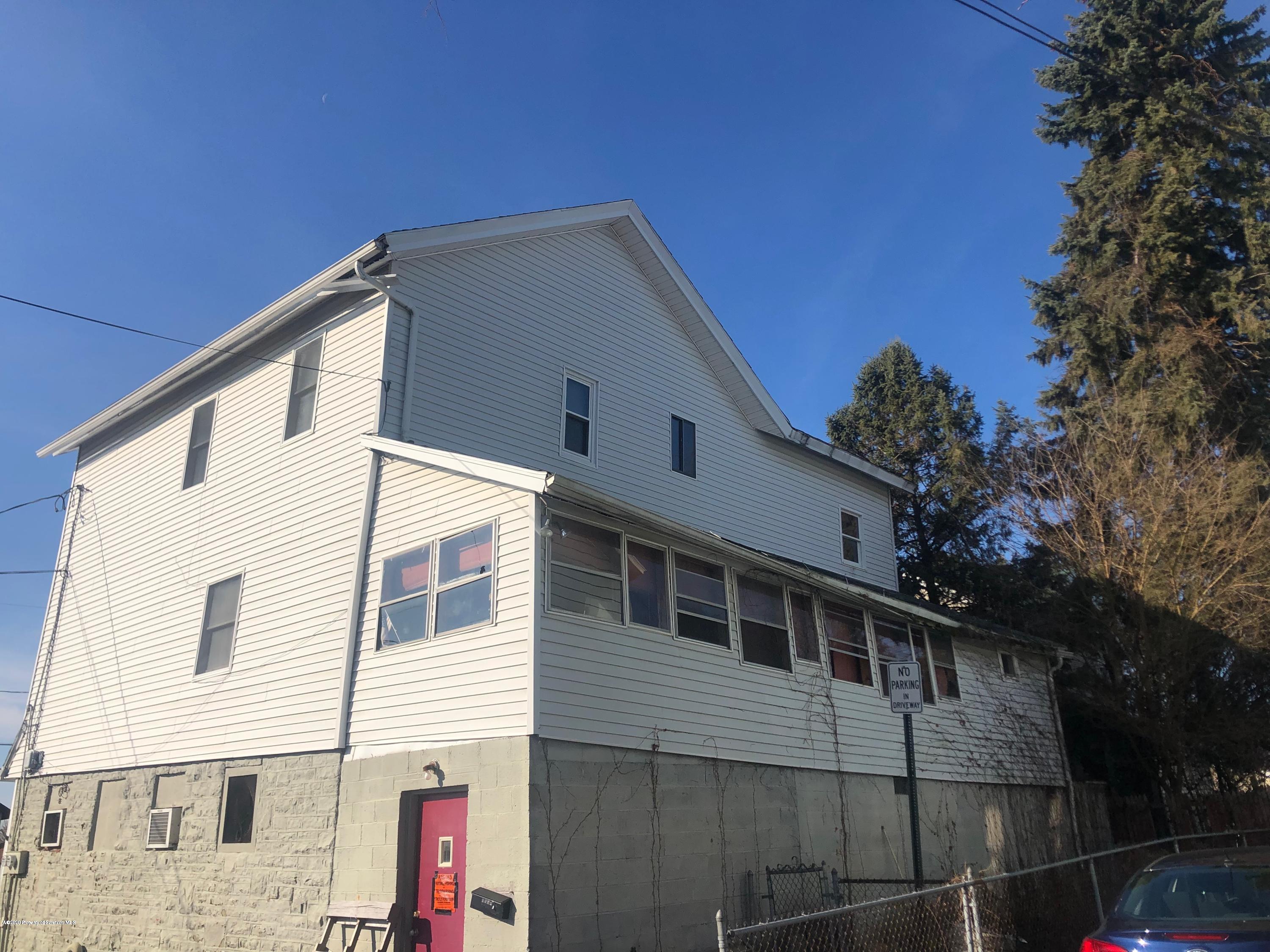 1902 Lafayette Street Scranton, PA 18504 - Photo 2 of 12 a front view of a house with a yard