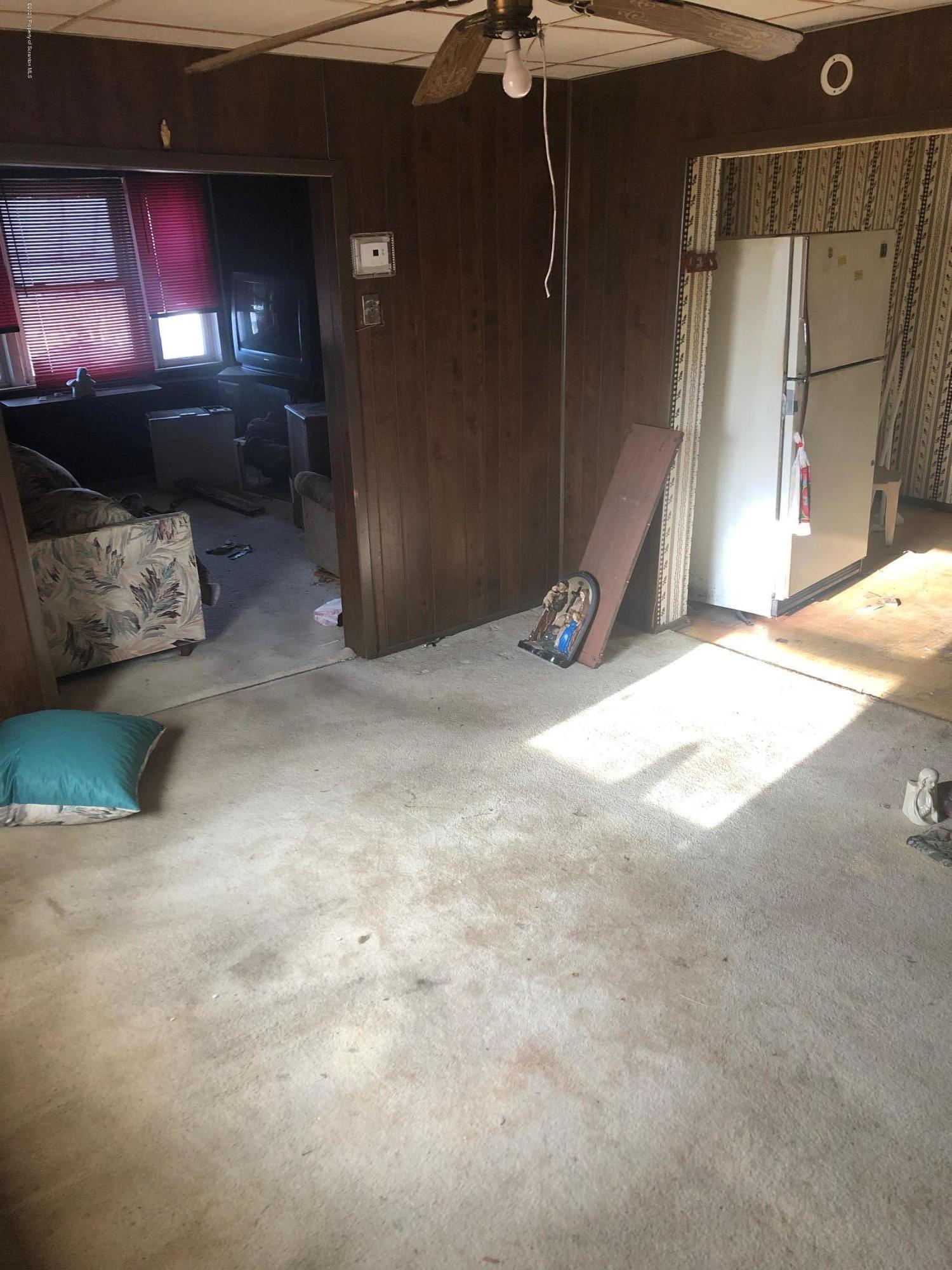 1902 Lafayette Street Scranton, PA 18504 - Photo 3 of 12 a view of a livingroom with furniture and a window