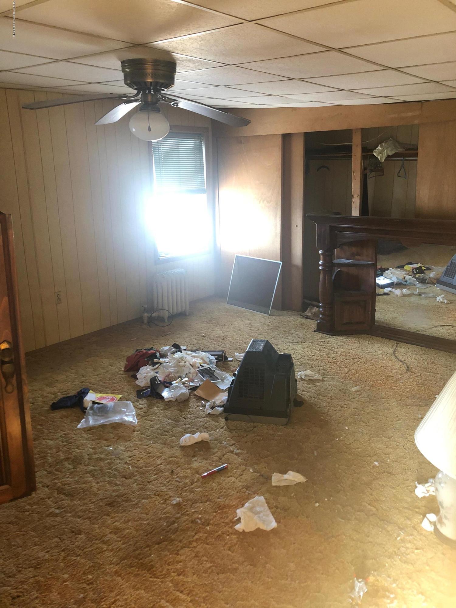 1902 Lafayette Street Scranton, PA 18504 - Photo 6 of 12 a bedroom with a bed and window