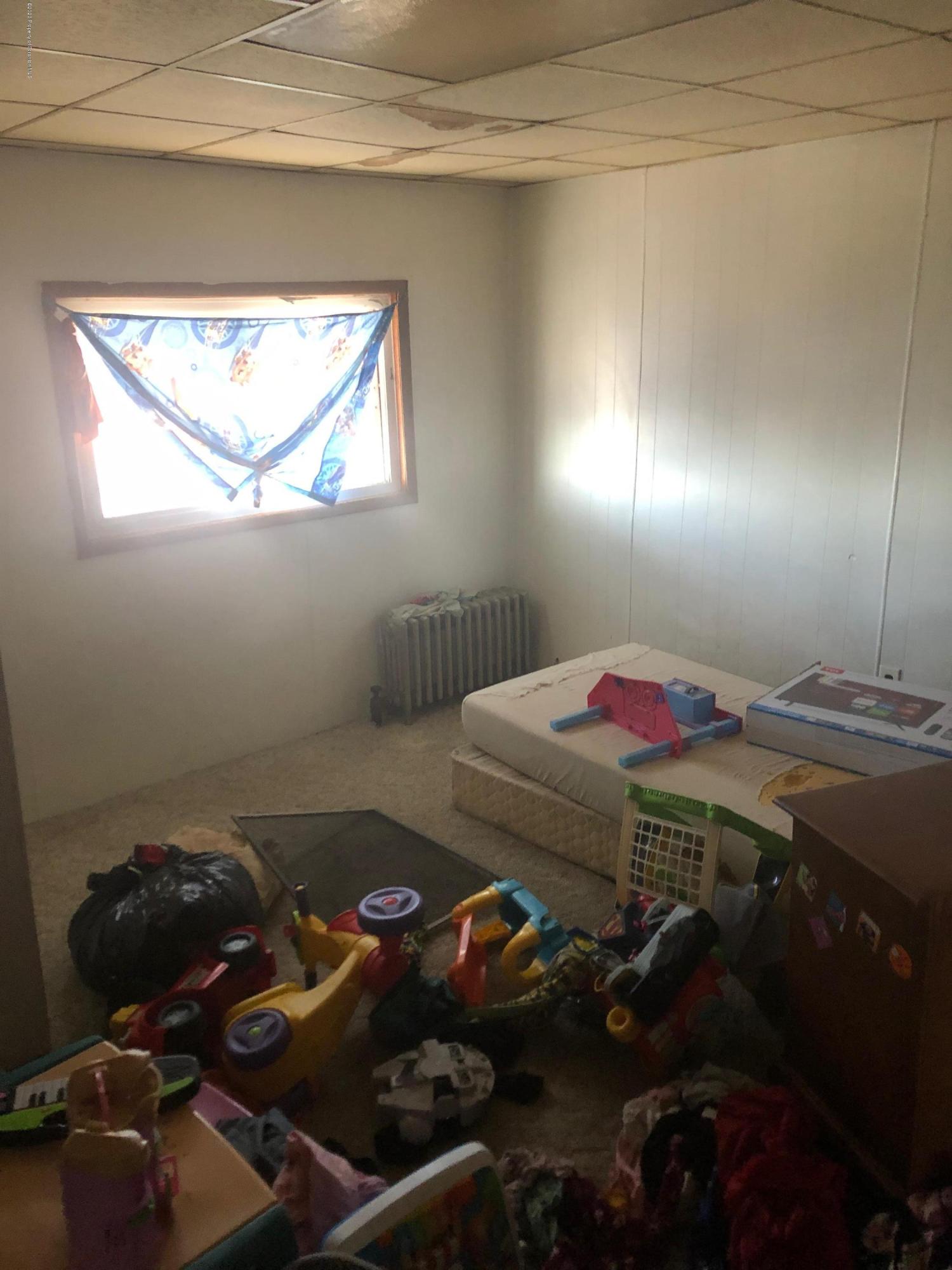 1902 Lafayette Street Scranton, PA 18504 - Photo 9 of 12 a room with a table and a fireplace