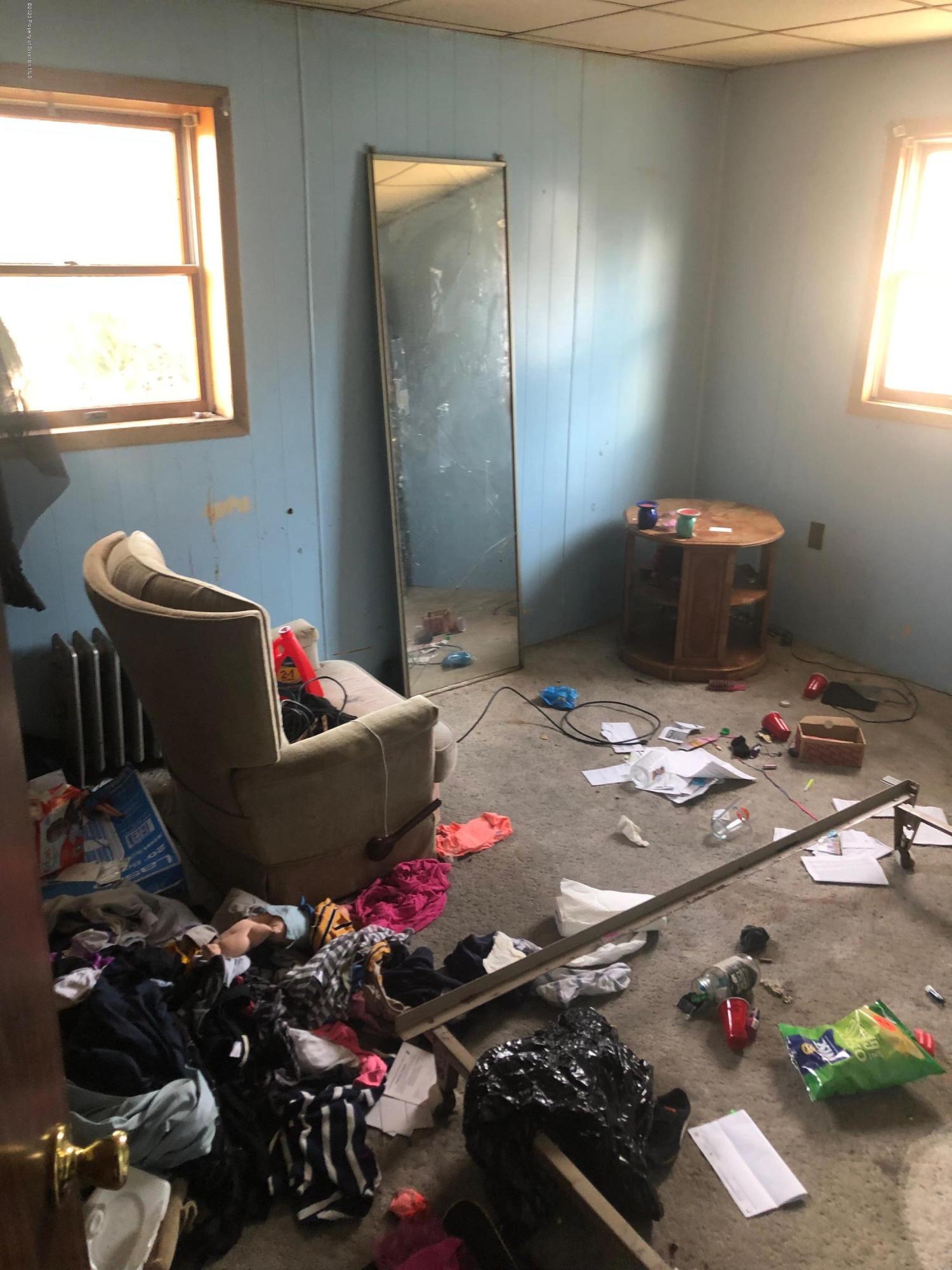 1902 Lafayette Street Scranton, PA 18504 - Photo 10 of 12 a living room with hard wood flooring and a couch