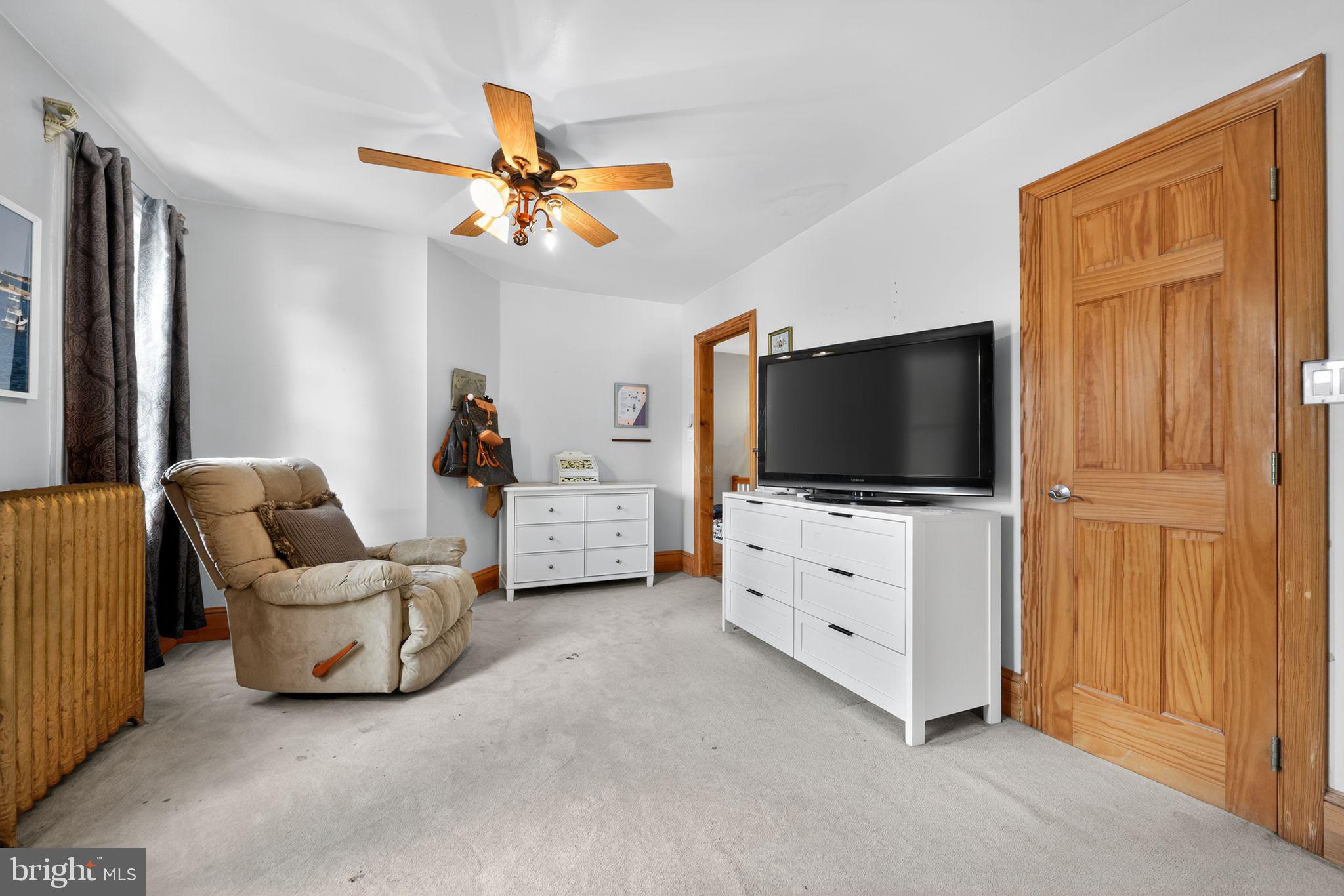 514 Park Avenue Laurel Springs, NJ 08021 - Photo 14 of 30 a living room with furniture and a flat screen tv