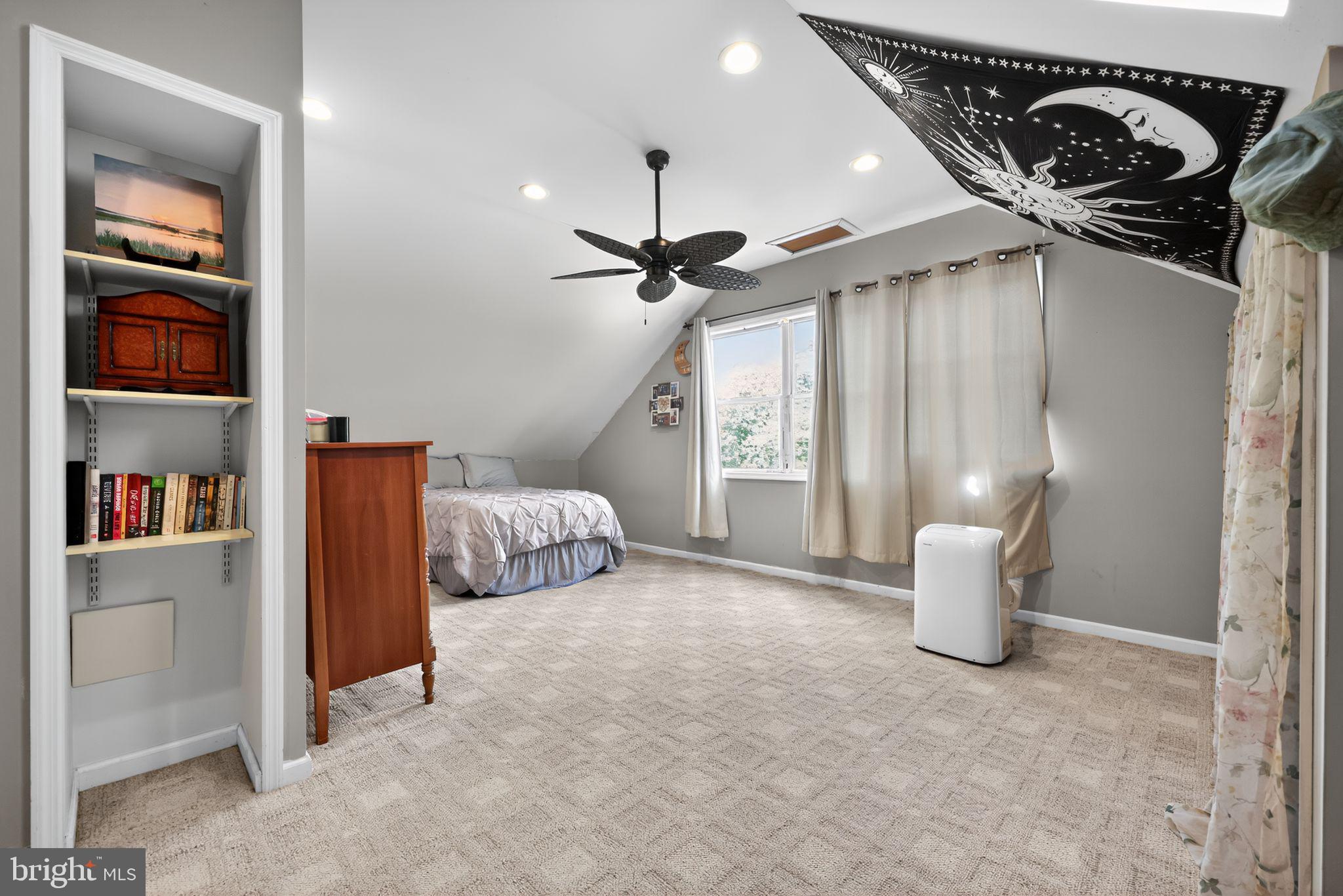 514 Park Avenue Laurel Springs, NJ 08021 - Photo 20 of 30 a bedroom with a bed and a book shelf