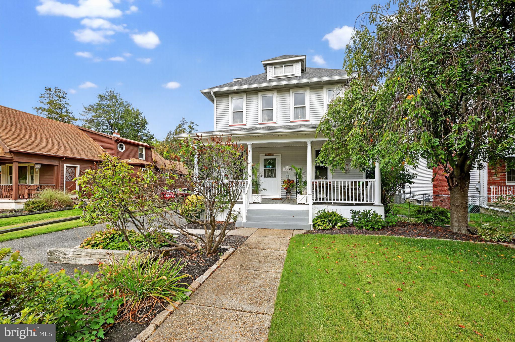 514 Park Avenue Laurel Springs, NJ 08021 - Photo 2 of 30 a front view of a house with a yard